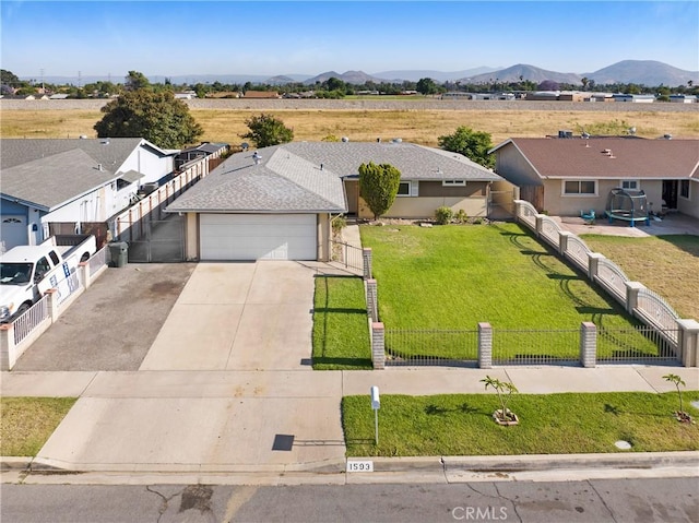 1593 W Carter St, Bloomington, CA 92316 - aerial view of property and surrounding area with a mountainous background