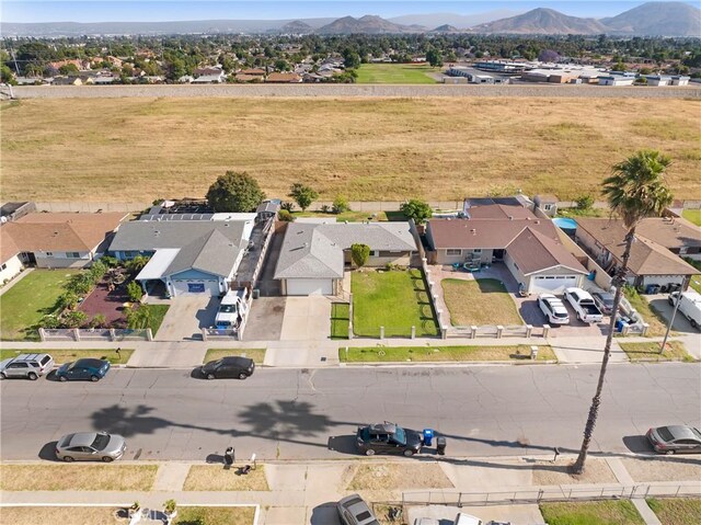 1593 W Carter St, Bloomington, CA 92316 - aerial view of residential area with a mountain backdrop