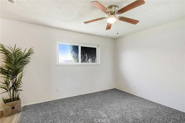 1593 W Carter St, Bloomington, CA 92316 - empty room featuring carpet flooring and a ceiling fan