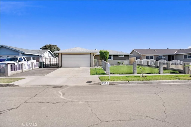 1593 W Carter St, Bloomington, CA 92316 - single story home featuring driveway, a fenced front yard, a garage, and a gate