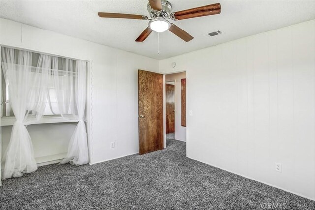 1593 W Carter St, Bloomington, CA 92316 - unfurnished bedroom with carpet and a ceiling fan