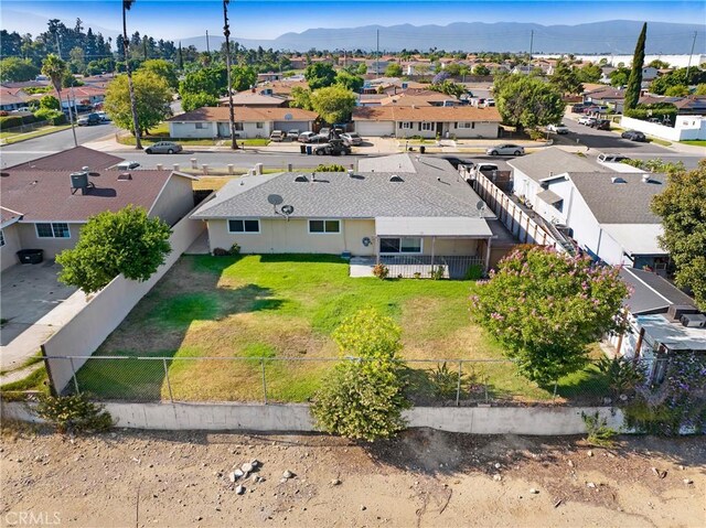 1593 W Carter St, Bloomington, CA 92316 - aerial view of residential area featuring a mountainous background