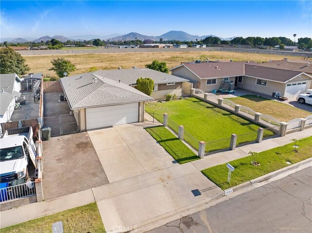 1593 W Carter St, Bloomington, CA 92316 - view from above of property with a mountain backdrop