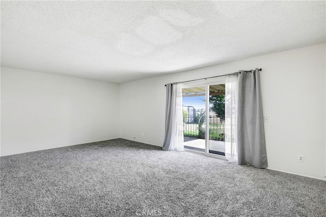 1593 W Carter St, Bloomington, CA 92316 - empty room featuring carpet and a textured ceiling
