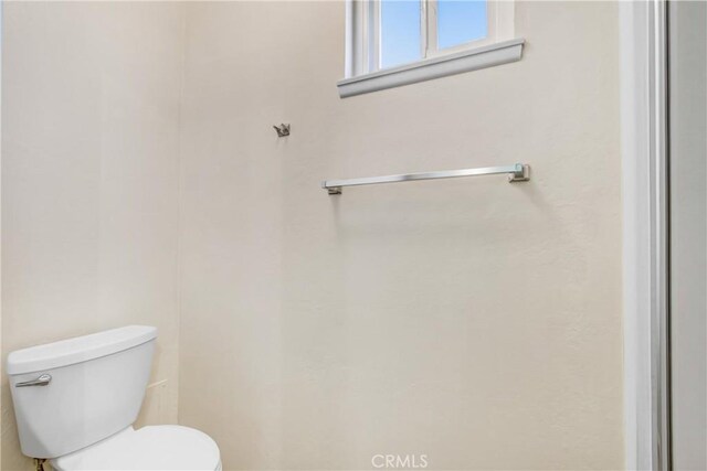 1593 W Carter St, Bloomington, CA 92316 - bathroom featuring toilet
