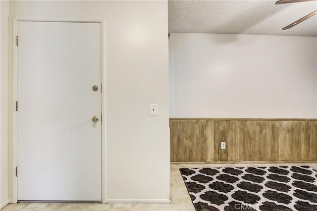 1593 W Carter St, Bloomington, CA 92316 - spare room with ceiling fan and a textured ceiling
