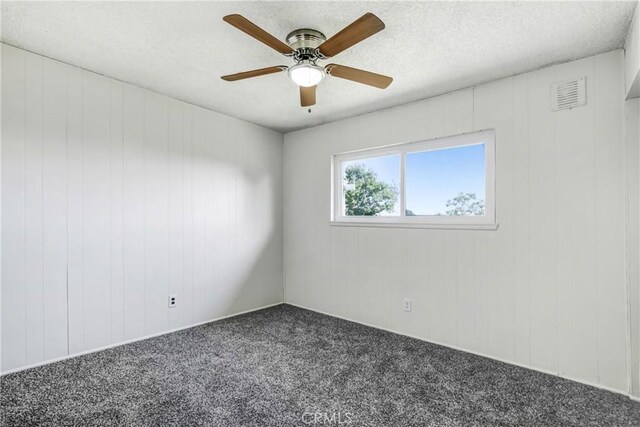 1593 W Carter St, Bloomington, CA 92316 - empty room featuring carpet floors and ceiling fan