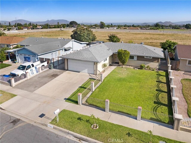 1593 W Carter St, Bloomington, CA 92316 - aerial view of property and surrounding area featuring a mountain backdrop