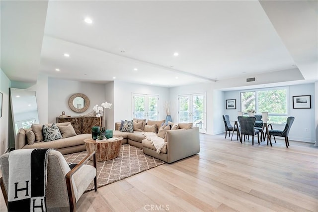137 S Wilson Ave Unit 107, Pasadena, CA 91106 - living room featuring light wood finished floors and recessed lighting