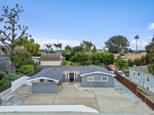 8123 Palm St, Lemon Grove, CA 91945 - view of front of home featuring a fenced backyard and a patio area