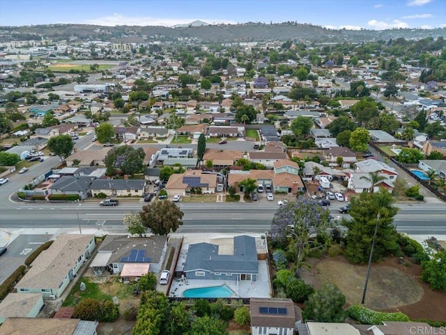 8123 Palm St, Lemon Grove, CA 91945 - aerial perspective of suburban area featuring a mountainous background