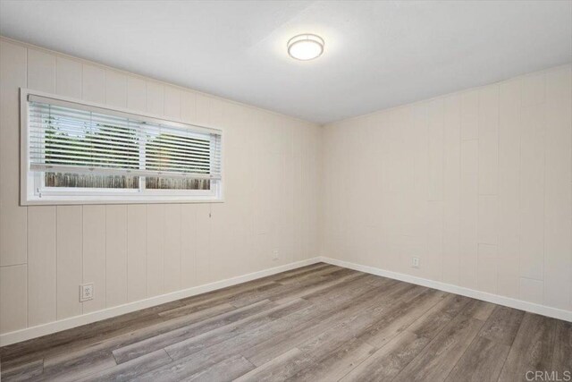 8123 Palm St, Lemon Grove, CA 91945 - empty room featuring wood finished floors