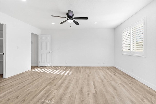 9546 San Pablo Ave, Hesperia, CA 92345 - empty room with light wood-style flooring, a ceiling fan, and recessed lighting