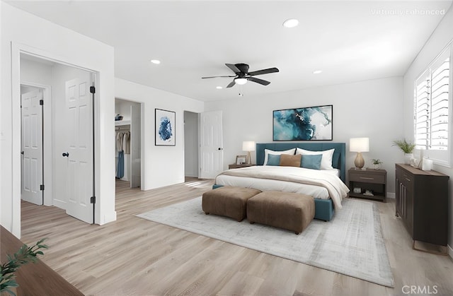 9546 San Pablo Ave, Hesperia, CA 92345 - bedroom featuring light wood-style floors, recessed lighting, a ceiling fan, and a walk in closet