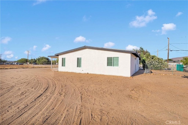 9546 San Pablo Ave, Hesperia, CA 92345 - view of side of property with stucco siding