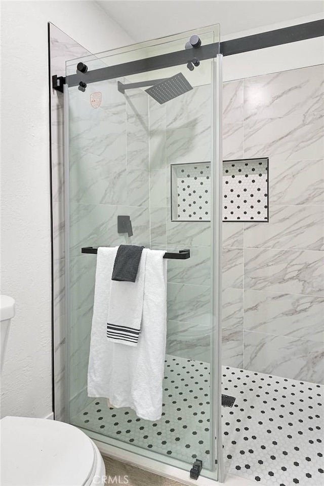 9546 San Pablo Ave, Hesperia, CA 92345 - bathroom with toilet and a marble finish shower