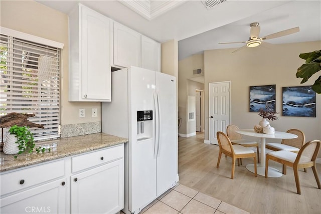 20 Via Jolitas, Rancho Santa Margarita, CA 92688 - kitchen featuring white fridge with ice dispenser, a ceiling fan, white cabinetry, and light tile patterned flooring