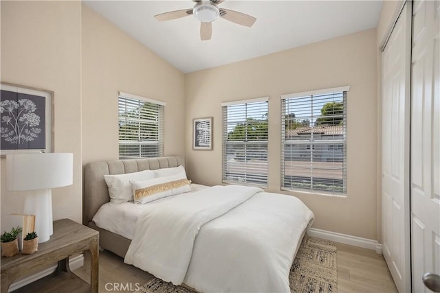 20 Via Jolitas, Rancho Santa Margarita, CA 92688 - bedroom with light wood finished floors, a closet, lofted ceiling, and a ceiling fan