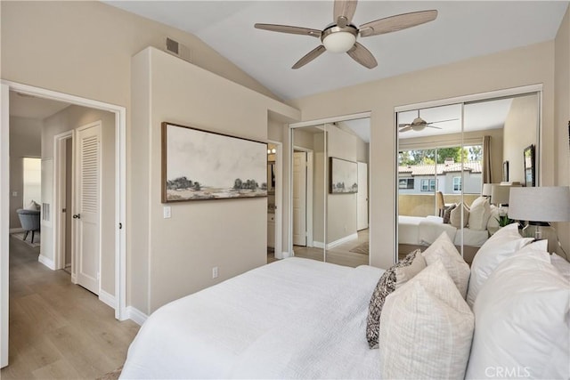 20 Via Jolitas, Rancho Santa Margarita, CA 92688 - bedroom with two closets, light wood finished floors, vaulted ceiling, and a ceiling fan