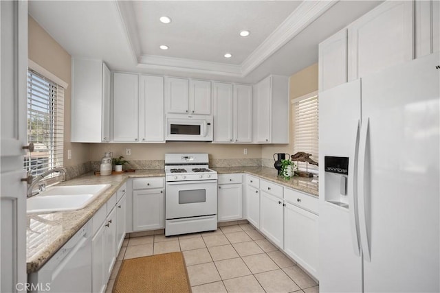 20 Via Jolitas, Rancho Santa Margarita, CA 92688 - kitchen with white appliances, light tile patterned flooring, a tray ceiling, white cabinetry, and recessed lighting