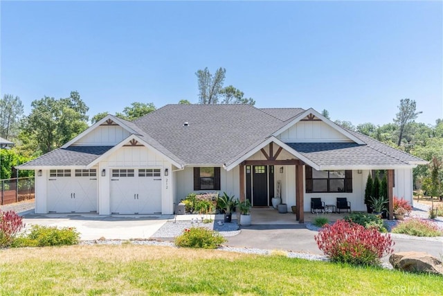 212 Valley View Dr, Paradise, CA 95969 - modern farmhouse with a garage, board and batten siding, a shingled roof, and driveway