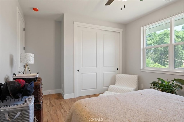 212 Valley View Dr, Paradise, CA 95969 - bedroom with light wood finished floors, a closet, and ceiling fan
