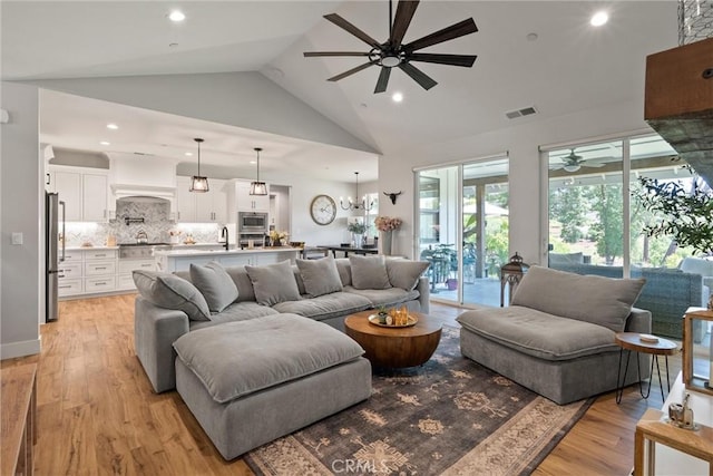 212 Valley View Dr, Paradise, CA 95969 - living room featuring ceiling fan, light wood-style floors, recessed lighting, and high vaulted ceiling