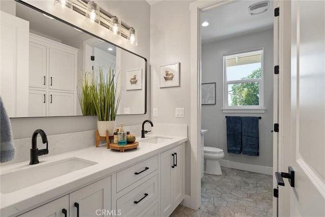 212 Valley View Dr, Paradise, CA 95969 - bathroom featuring double vanity and recessed lighting