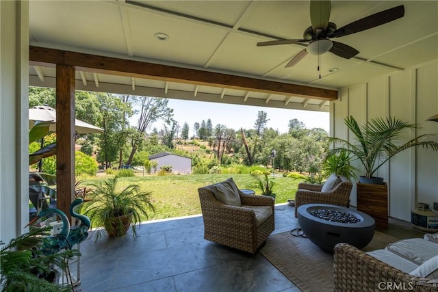 212 Valley View Dr, Paradise, CA 95969 - view of patio featuring a ceiling fan and a fire pit