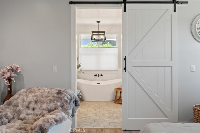 212 Valley View Dr, Paradise, CA 95969 - bathroom featuring a soaking tub and wood finished floors