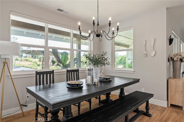 212 Valley View Dr, Paradise, CA 95969 - dining room with a chandelier and light wood finished floors