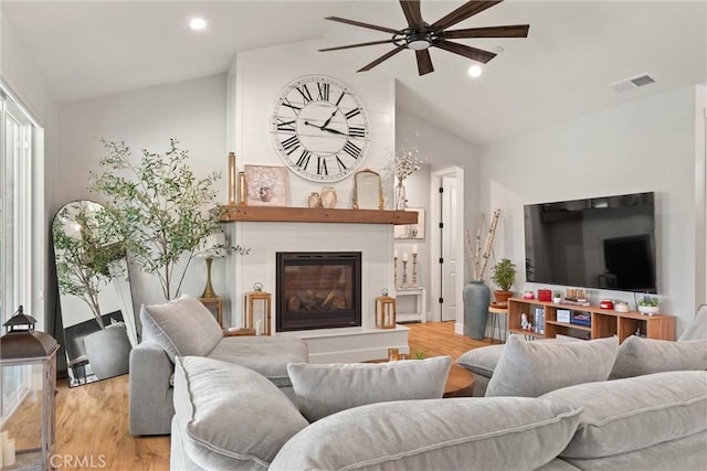 212 Valley View Dr, Paradise, CA 95969 - living room with ceiling fan, light wood-style floors, a fireplace, recessed lighting, and high vaulted ceiling