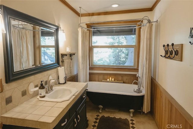 32383 Pine Manor Ln Unit 634, Running Springs, CA 92382 - full bath with a soaking tub, vanity, healthy amount of natural light, crown molding, and wainscoting