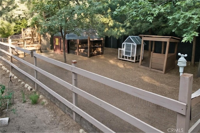 32383 Pine Manor Ln Unit 634, Running Springs, CA 92382 - view of yard featuring exterior structure and an outbuilding