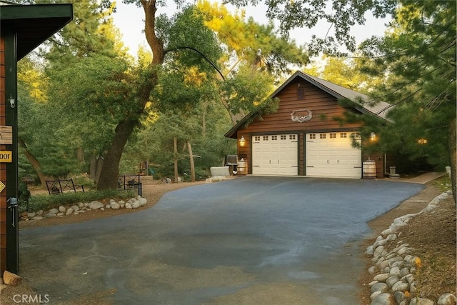32383 Pine Manor Ln Unit 634, Running Springs, CA 92382 - garage featuring asphalt driveway