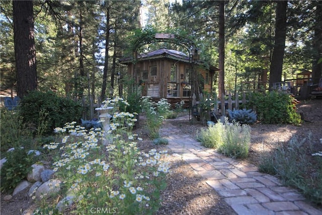32383 Pine Manor Ln Unit 634, Running Springs, CA 92382 - rear view of house featuring an outbuilding