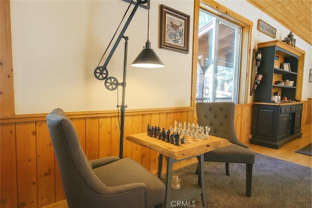 32383 Pine Manor Ln Unit 634, Running Springs, CA 92382 - sitting room with a wainscoted wall, light wood finished floors, and wood walls