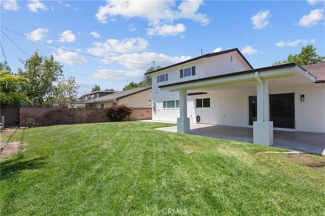 19548 Cedarcreek St, Canyon Country, CA 91351 - back of property with a patio and stucco siding