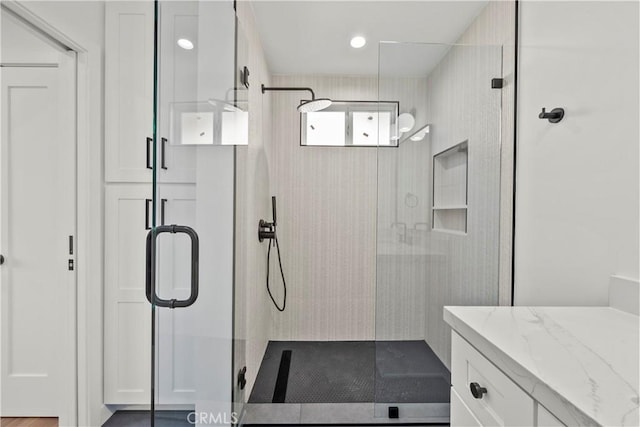 19548 Cedarcreek St, Canyon Country, CA 91351 - bathroom featuring a shower stall, vanity, and recessed lighting