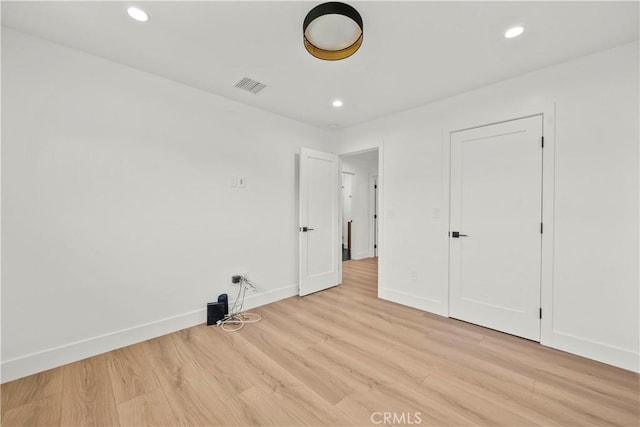 19548 Cedarcreek St, Canyon Country, CA 91351 - unfurnished bedroom with light wood-style floors and recessed lighting