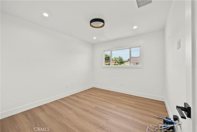 19548 Cedarcreek St, Canyon Country, CA 91351 - spare room featuring wood finished floors and recessed lighting