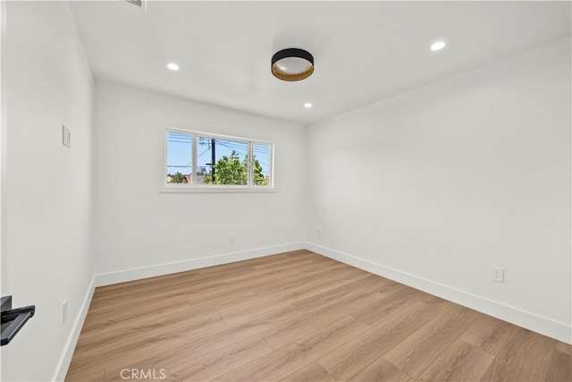 19548 Cedarcreek St, Canyon Country, CA 91351 - unfurnished room featuring light wood-style floors and recessed lighting