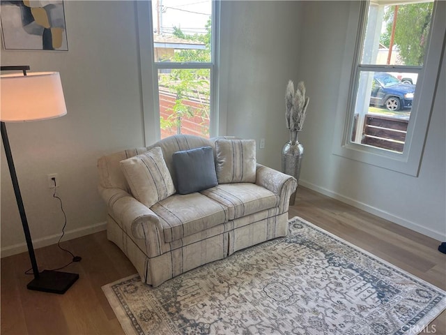 1231 Webster St, Redlands, CA 92374 - living area with baseboards and wood finished floors