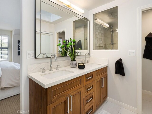 502 Washington St, El Segundo, CA 90245 - bathroom featuring double vanity, ensuite bath, a tile shower, and tile patterned floors