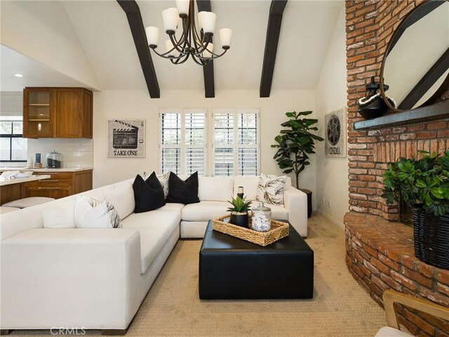 502 Washington St, El Segundo, CA 90245 - living area featuring a chandelier and light colored carpet