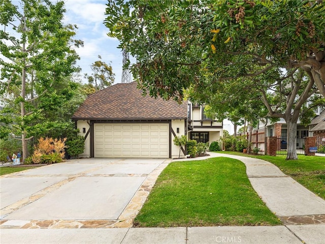502 Washington St, El Segundo, CA 90245 - view of front of house featuring stucco siding, a garage, driveway, and roof with shingles