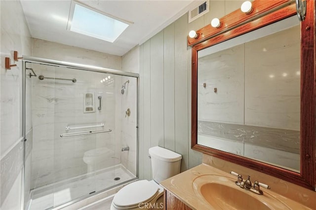 750 Via Los Santos, San Dimas, CA 91773 - full bathroom featuring a skylight, vanity, and a marble finish shower