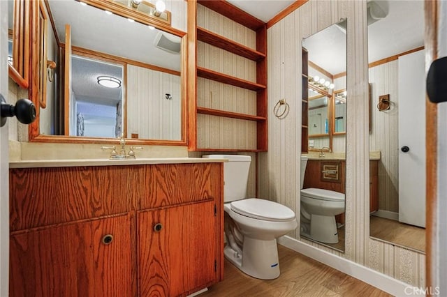750 Via Los Santos, San Dimas, CA 91773 - bathroom with wood finished floors, wallpapered walls, and vanity
