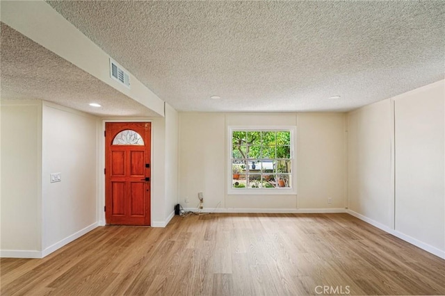 750 Via Los Santos, San Dimas, CA 91773 - entryway featuring wood finished floors, a textured ceiling, and recessed lighting