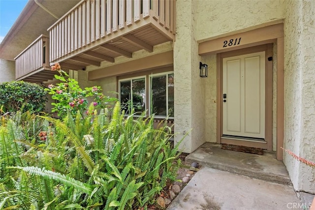 2811 Via Topacio, Carlsbad, CA 92010 - entrance to property featuring a balcony and stucco siding